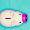 A picture of a piggy bank - A picture of a pink piggy bank on a blue background