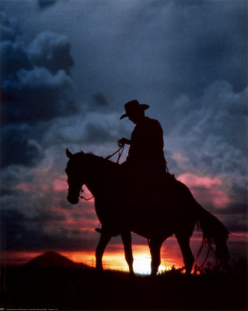 Cowboy riding and sunset - The lone cowboy riding off into the sunset...