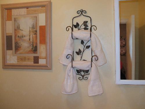 Decorative plate holder used a towel bar! - Pretty plate holder I had and used to hang decorative towel on in my bathroom.