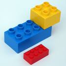 Duplo Blocks - A Duplo block comapired to a regular lego. Thes can cause damage when stepped on