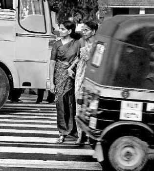 Traffic hazards - There are laws to make traffic smooth and safe for people, but in real life crossing roads is a hazard.