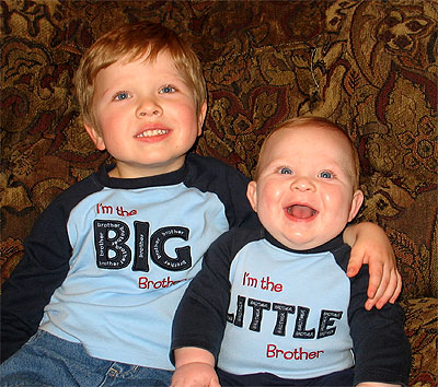 Brothers - 2 brothers both very young. very cute. Look at the tubby baby one.