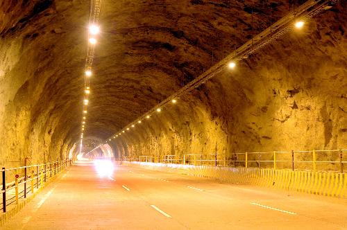 tunnel - dark tunnel with a light at the end of it