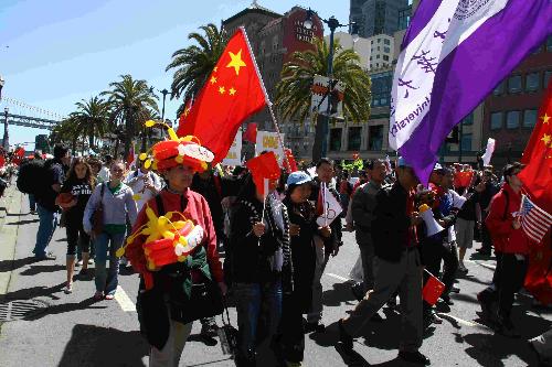 young and old, man and women, support the Olympics - yound and old, man and women, support the Olympics torch