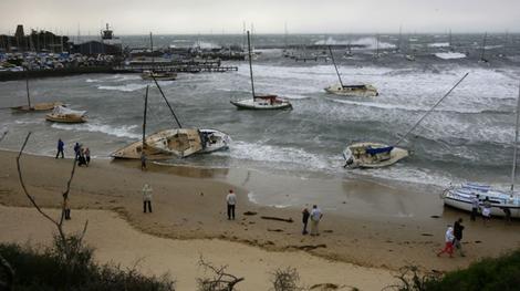 Tsunami aftermath affects - Tsunami wased the vessels of the shore creating a huge wreckage.