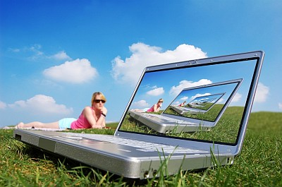 laptop pc - A laptop pc on the grass
