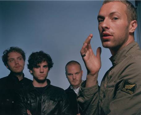 Coldplay - Chris Martin in shines in the forefront while his bandsmates stand behind