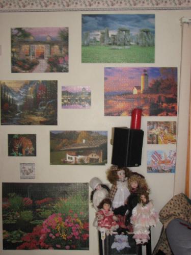 Puzzles - One wall covered in puzzles.
