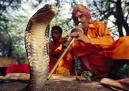 Snake charmer - picture by nationalgeograhic.com