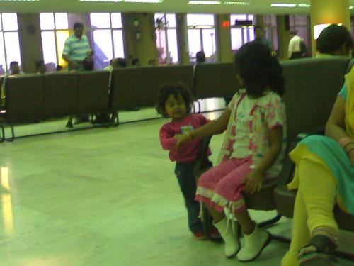 Kiasu and Sia at airport - Kishu and Sia are waiting for flight to be announced
