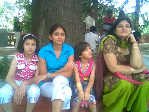 family outing - We are out to enjoy and are at kasuli outside a church with my children and my niece.
