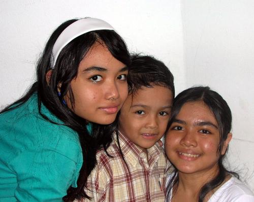 2 sisters and a brother - These are my 2 daughters with son Adam.