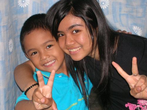 Eldest daughter with adam - This one was taken last 2 years. Along with Adam posing for the camera. Smile everyone.
