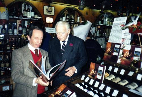 My L8 hubby & his friend of many years Douglas Fai - My husband is on the left showing his newly released book to his friend Douglas Fairbanks Jr., pictured on the right. That's really him. He was my husband's best man at his previous marriage. Sadly he'd passed before we wed in 2002.