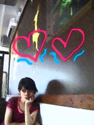 looking for love? - this pic was taken in my favorite coffee shop at my favorite mall. i just added a few effects to the picture and voila!... heart heart heart =)
