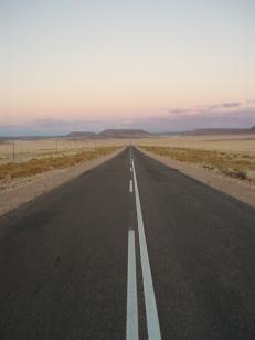 Namibia - road to nowhere - Driving is great on Namibia. This is the road that leads of Luderitz, so the only way to get in or out and still it's usually this empty. There are just no people in Namibia. Its such a stark contrast to a lot of other countries, especially European ones where everything is covered with buildings, cars or at least people. Beautiful.