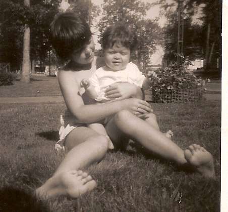 My sister Linda and I  - My sister Linda is 9 years older than I. This pic was taken when I was about a year old, and my sister was 9. This is one of my favorite sister pics.