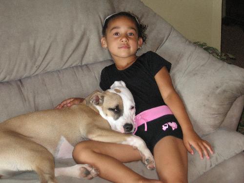 Princess with my youngest child - This is the 'aggressive' dog I'm talking about. Mean huh?? lol she is the most loving dog I've ever met...never acted bad towards us, my kids or my cats...what happened? Spring fever??