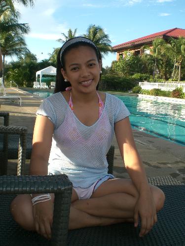 Swimming time - a shot by my sister, the pool was so clean and the flower smells and looks good. during that time staying in that resort i feel like a princess cause they felt me that i am a princess