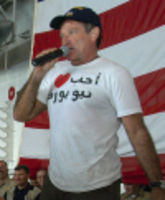 Robin Williams  - Robin Williams wearing an I love New York tshirt written in Arabic 