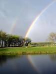 double rainbow. - actually as i concider, there is always a double rainbow when we see a rainbow.
some times the second one is bright otherwise it remain very light. so next time when you see a rainbow search the second one around first