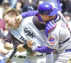 Barrett Punching Pierzynski - Michael Barrett of the Cubs punching A.J. Pierzynski of the Chicago White Sox.