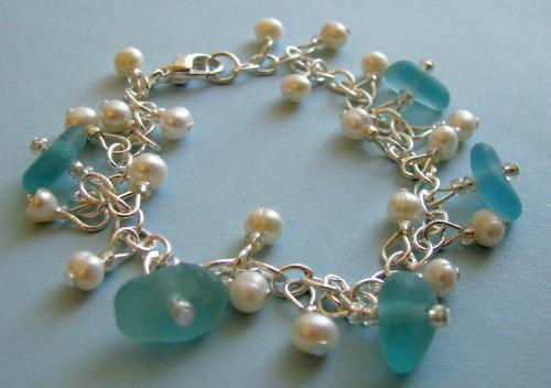 Aqua/Light Turquoise Sea Glass Bracelet - 5 beautifully smooth pieces of aqua/light turquoise beach glass are the focal pieces to this bracelet. White fresh water pearls accent the 5 ocean gems. Available at my online shop at Etsy.com