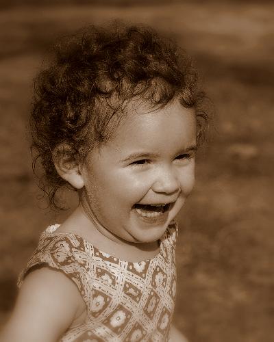 All Smiles - Mimi cheering on daddy and his friends while they worked out outside.