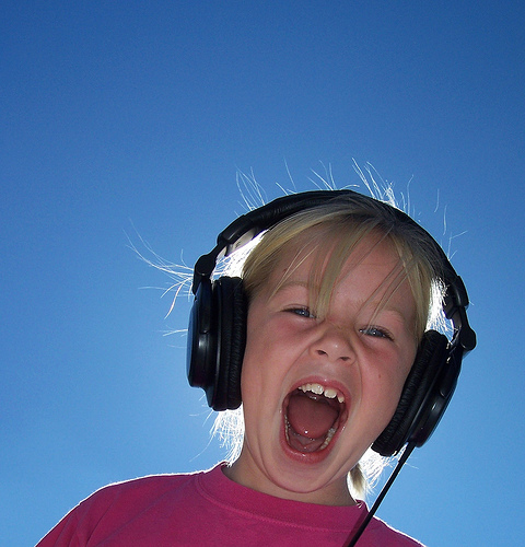 Can you survive without noise? - A picture of a kid wearing headphones. Photo source: http://farm3.static.flickr.com/2382/1657626179_8779b5238d.jpg?v=0 .