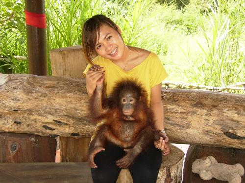 My picture and baby Orang hutan - Look at her eyes! isn't she adorable?