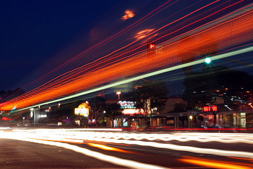 Here is an example of what I can do with my camera - I took this photo at night with a long exposure. It captured the streaking headlights of the buses and cars in the area.