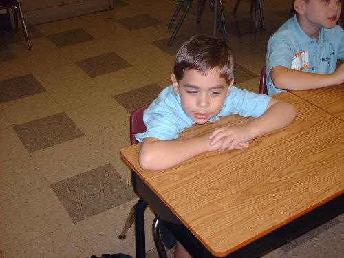 my son plotting his revenge for making him go to s - my son's first day of first grade.