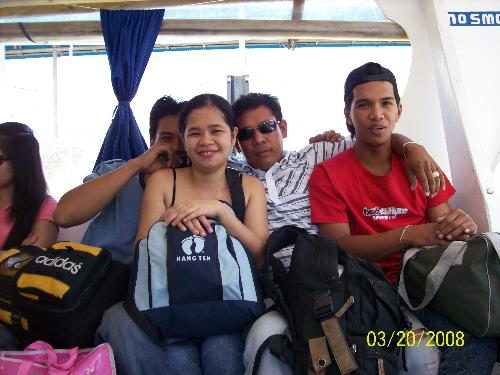 Travelling at the boat - me with rollie, vincent and sonny while riding on the boat on the way to Puerto Galera.