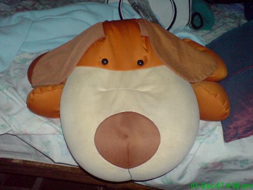 My Pet - This is my pet dog which I always have in my bed. Its a stuffed toy microbeads and very soft. I prefer using that more than my pillows. The shot was taken by my brother and was surprised to see it in my cell and thought initially it was a real dog. Funny isnt it? Cute huh?