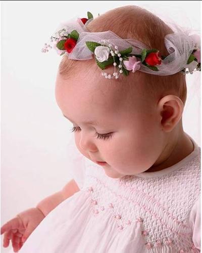 Beautiful baby - A beautiful baby she is! I have sons but no daughter. Wished she was mine......