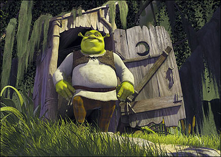 Shrek and the outhouse - Shrek looking happy after using the commodities