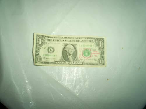 Registered Dollar Bill - Our first registered dollar bill..Came from Las Vegas..It took 1 Yr, 45 Days, 1 Hr, 4 Mins to get to us and traveled 1,678 miles.