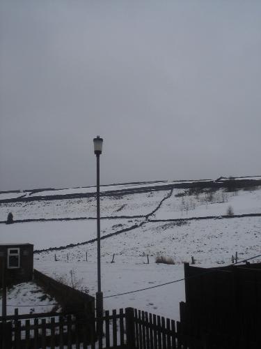 snow in my village  - evewn though it is spring time we still have snow in our village  blessed be