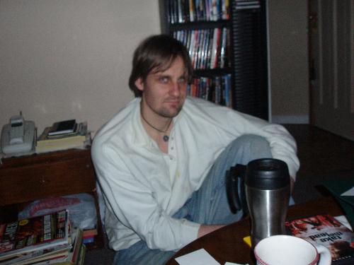 My hubs - This is a picture of my husband relaxing at home. As usual, he has his cup of coffee...LOL