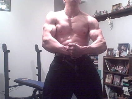 displaying my upper body physique and muscularity - a photo from a monthly flex session that i did on 4/8/08,as well as posting a few videos of that days workout and flexing.