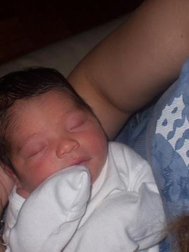 Grandson - Here is Devin he is my youngest grandson, this is a newborn picture what a cutie huh!