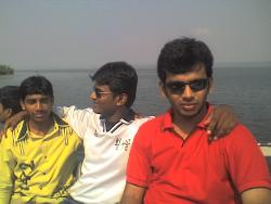 The red T-shirt is one is me...the other two are m - At the river side...enjoying