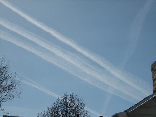 Chemtrails over my house - This is 10-20 minutes after they&#039;ve been laid down.. Notice how close they are, and the size of the chemtrail alludes to the fact that the planes passed within 1 minute of eachother.. (1 minute from the first to last plane)

Ask yourself, is this normal?