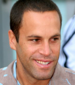 Jack Johnson - Jack Johnson ECU with a half smile wearing a tan shirt