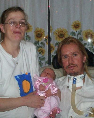 this is my brother inlaw and his wife and there ne - how cute she is huh this is my brother in law carl his new baby gurl and his wife he is prett cool to have as a brother inlaw
