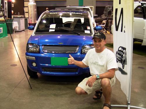 Electric Car gets the Green License Plate - William puts the Green License Plate on an Electric Car at the Green Living Expo in LA. Looks great.