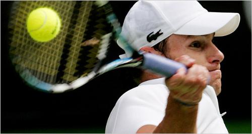 Roddick - Andy Roddick hitting a tennis ball.