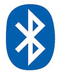 bluetooth - Bluetooth is an industrial specification for wireless personal area networks (PANs). Bluetooth provides a way to connect and exchange information between devices such as mobile phones, laptops, personal computers, printers, GPS receivers, digital cameras, and video game consoles over a secure, globally unlicensed short-range radio frequency. The Bluetooth specifications are developed and licensed by the Bluetooth Special Interest Group.  Uses  Bluetooth is a standard and communications protocol primarily designed for low power consumption, with a short range (power-class-dependent: 1 meter, 10 meters, 100 meters) based on low-cost transceiver microchips in each device.[1]  Bluetooth enables these devices to communicate with each other when they are in range. The devices use a radio communications system, so they do not have to be in line of sight of each other, and can even be in other rooms, as long as the received transmission is powerful enough.Class	Maximum Permitted Power mW(dBm)	Range (approximate) Class 1	100 mW (20 dBm)	~100 meters Class 2	2.5 mW (4 dBm)	~10 meters Class 3	1 mW (0 dBm)	~1 meter   In most cases the effective range of class 2 devices is extended if they connect to a class 1 transceiver, compared to pure class 2 network. This is accomplished by the higher sensitivity and transmission power of Class 1 devices.Version	Data Rate Version 1.2	1 Mbit/s Version 2.0 + EDR	3 Mbit/s WiMedia Alliance (proposed)	53 - 480 Mbit/s   [edit] Bluetooth profiles Main article: Bluetooth profile  In order to use Bluetooth, a device must be compatible with certain Bluetooth profiles. These define the possible applications and uses of the technology.  [edit] List of applications   A typical Bluetooth mobile phone headset  More prevalent applications of Bluetooth include: Wireless control of and communication between a mobile phone and a hands-free headset. This was one of the earliest applications to become popular. Wireless networking between PCs in a confined space and where little bandwidth is required. Wireless communications with PC input and output devices, the most common being the mouse, keyboard and printer. Transfer of files between devices with OBEX. Transfer of contact details, calendar appointments, and reminders between devices with OBEX. Replacement of traditional wired serial communications in test equipment, GPS receivers, medical equipment, bar code scanners, and traffic control devices. For controls where infrared was traditionally used. Sending small advertisements from Bluetooth enabled advertising hoardings to other, discoverable, Bluetooth devices. Two seventh-generation game consoles, Nintendo's Wii[2] and Sony's PlayStation 3 use Bluetooth for their respective wireless controllers. Dial-up internet access on personal computer or PDA using a data-capable mobile phone as a modem.  [edit] Bluetooth vs. Wi-Fi in networking	This article does not cite any references or sources. (March 2008) Please help improve this article by adding citations to reliable sources. Unverifiable material may be challenged and removed. 	The tone or style of this article or section may not be appropriate for Wikipedia. Specific concerns may be found on the talk page. See Wikipedia's guide to writing better articles for suggestions.(March 2008)   Bluetooth and Wi-Fi have slightly different applications in today's offices, homes, and on the move: setting up networks, printing, or transferring presentations and files from PDAs to computers. Both are versions of unlicensed spread spectrum technology.  Bluetooth differs from Wi-Fi in that the latter provides higher throughput and covers greater distances, but requires more expensive hardware and higher power consumption. They use the same frequency range, but employ different modulation techniques. While Bluetooth is a replacement for a variety of applications, Wi-Fi is a replacement only for local area network access. Bluetooth can be thought of as wireless USB[citation needed], whereas Wi-Fi is wireless Ethernet[citation needed], both operating at much lower bandwidth[citation needed] than cable networking systems. However, this analogy is not entirely accurate since any Bluetooth device can, in theory, host any other Bluetooth device—something that is not universal to USB devices, therefore it would resemble more a wireless FireWire.  [edit] Bluetooth Devices  Bluetooth exists in many products, such as telephones, printers, modems and headsets. The technology is useful when transferring information between two or more devices that are near each other in low-bandwidth situations. Bluetooth is commonly used to transfer sound data with telephones (i.e. with a Bluetooth headset) or byte data with hand-held computers (transferring files).  Bluetooth simplifies the discovery and setup of services between devices. Bluetooth devices advertise all of the services they provide. This makes using services easier because there is no longer a need to set up network addresses or permissions as in many other networks.  [edit] Wi-Fi  Wi-Fi is more like a traditional Ethernet network, and requires configuration to set up shared resources, transmit files, and to set up audio links (for example, headsets and hands-free devices). It uses the same radio frequencies as Bluetooth, but with higher power resulting in a stronger connection. Wi-Fi is sometimes called 'wireless Ethernet.' This description is accurate as it also provides an indication of its relative strengths and weaknesses. Wi-Fi requires more setup, but is better suited for operating full-scale networks because it enables a faster connection, better range from the base station, and better security than Bluetooth.  [edit] Computer requirements   A typical Bluetooth USB dongle, shown here next to a metric ruler   An internal notebook Bluetooth card (14×36×4 mm)  A personal computer must have a Bluetooth adapter in order to be able to communicate with other Bluetooth devices (such as mobile phones, mice and keyboards). While some desktop computers and most recent laptops come with a built-in Bluetooth adapter, others will require an external one in the form of a dongle.  Unlike its predecessor, IrDA, which requires a separate adapter for each device, Bluetooth allows multiple devices to communicate with a computer over a single adapter.  [edit] Operating system support For more details on this topic, see Bluetooth stack.  Apple has supported Bluetooth since Mac OS X v10.2 released in 2002.[3]  For Microsoft platforms, Windows XP Service Pack 2 and later releases have native support for Bluetooth. Previous versions required users to install their Bluetooth adapter's own drivers, which were not directly supported by Microsoft.[4] Microsoft's own Bluetooth dongles (packaged with their Bluetooth computer devices) have no external drivers and thus require at least Windows XP Service Pack 2.  Linux provides two Bluetooth stacks, with the BlueZ [5] stack included with most Linux kernels. It was originally developed by Qualcomm and Affix. BlueZ supports all core Bluetooth protocols and layers. FreeBSD features Bluetooth support since its 5.0 release. NetBSD features Bluetooth support since its 4.0 release. Its Bluetooth stack has been ported to OpenBSD as well.  [edit] Specifications and features  The Bluetooth specification was developed in 1994 by Jaap Haartsen and Sven Mattisson, who were working for Ericsson Mobile Platforms in Lund, Sweden.[6] The specification is based on frequency-hopping spread spectrum technology.  The specifications were formalized by the Bluetooth Special Interest Group (SIG), organised by Mohd Syarifuddin. The SIG was formally announced on May 20, 1998. Today it has a membership of over 7000 companies worldwide. It was established by Ericsson, Sony Ericsson, IBM, Intel, Toshiba, and Nokia, and later joined by many other companies.  [edit] Bluetooth 1.0 and 1.0B  Versions 1.0 and 1.0B had many problems, and manufacturers had difficulty making their products interoperable. Versions 1.0 and 1.0B also included mandatory Bluetooth hardware device address (BD_ADDR) transmission in the Connecting process (rendering anonymity impossible at the protocol level), which was a major setback for certain services planned for use in Bluetooth environments.  [edit] Bluetooth 1.1 Ratified as IEEE Standard 802.15.1-2002. Many errors found in the 1.0B specifications were fixed. Added support for non-encrypted channels. Received Signal Strength Indicator (RSSI).  [edit] Bluetooth 1.2  This version is backward-compatible with 1.1 and the major enhancements include the following: Faster Connection and Discovery Adaptive frequency-hopping spread spectrum (AFH), which improves resistance to radio frequency interference by avoiding the use of crowded frequencies in the hopping sequence. Higher transmission speeds in practice, up to 721 kbit/s, as in 1.1. Extended Synchronous Connections (eSCO), which improve voice quality of audio links by allowing retransmissions of corrupted packets, and may optionally increase audio latency to provide better support for concurrent data transfer. Host Controller Interface (HCI) support for three-wire UART. Ratified as IEEE Standard 802.15.1-2005.  [edit] Bluetooth 2.0  This version, specified on November 10, 2004, is backward-compatible with 1.1. The main enhancement is the introduction of an Enhanced Data Rate (EDR) of 3.0 Mbit/s for both data (ACL) and voice (eSCO) packets. This has the following effects:[7] Three times faster transmission speed—up to 10 times in certain cases (up to 2.1 Mbit/s). Lower power consumption through a reduced duty cycle. Simplification of multi-link scenarios due to more available bandwidth.  The practical data transfer rate is 2.1 megabits per second and the basic signalling rate is about 3 megabits per second.[8] The 'Bluetooth 2.0 + EDR' sp