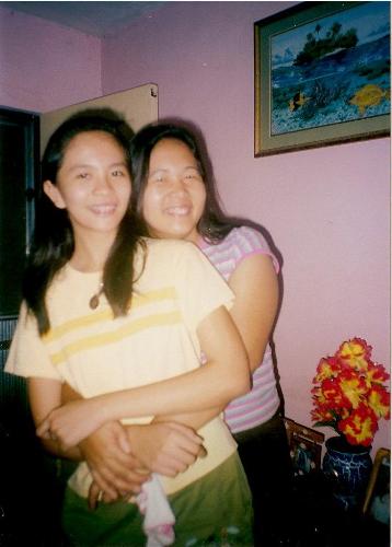 my mom and I - In this photo, my mom and I have agreed to take the last shots available at the camera used so we posed as sweet as possible. ;)