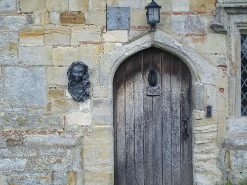 Entrance From Herb Garden - Michelham Priory - The entrance from the herb garden, with a sundial above.